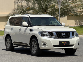 Nissan  Patrol  SE  2014  Automatic  226,000 Km  8 Cylinder  Four Wheel Drive (4WD)  SUV  White