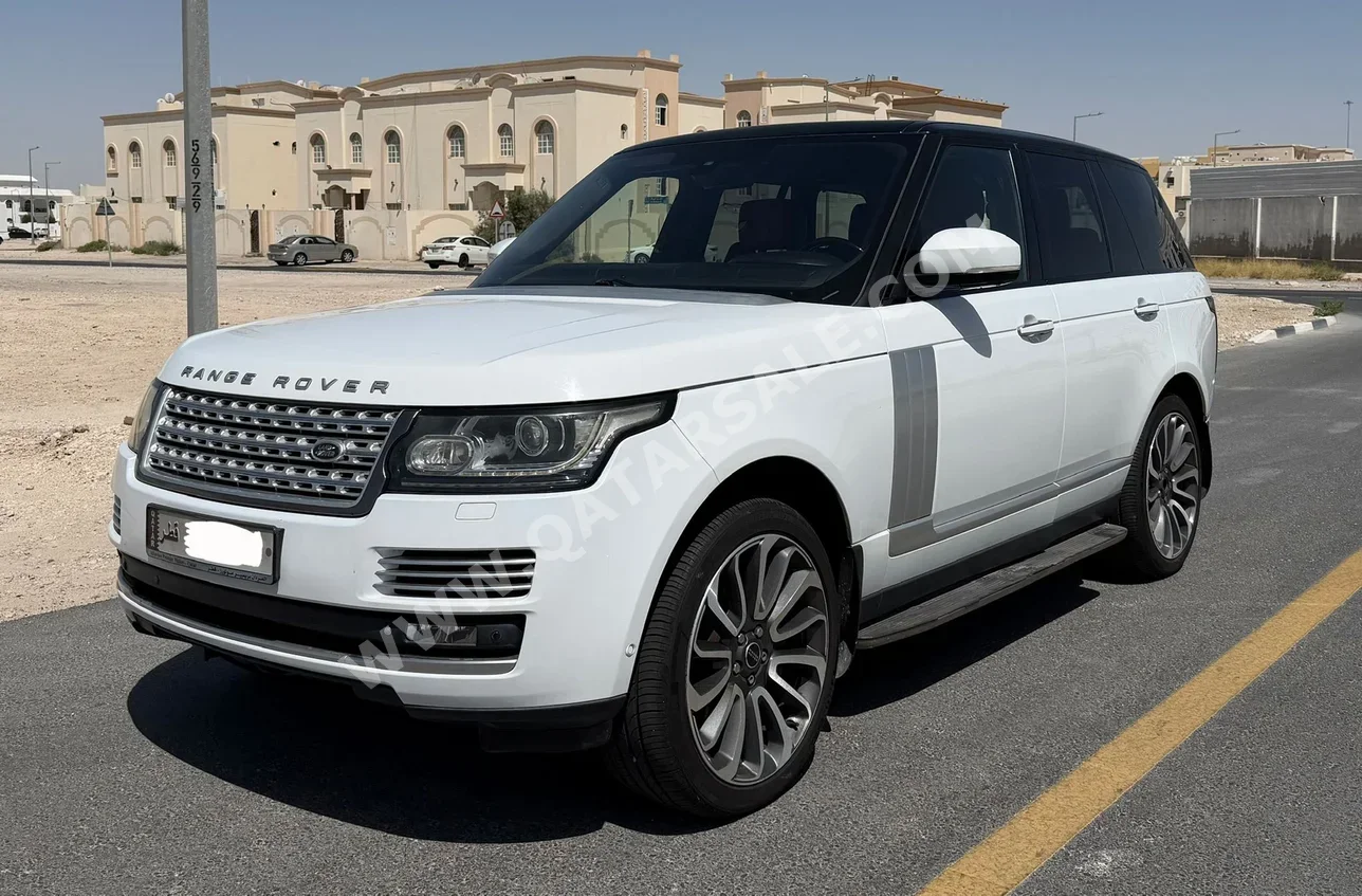 Land Rover  Range Rover  Vogue  Autobiography  2014  Automatic  255,000 Km  8 Cylinder  Four Wheel Drive (4WD)  SUV  White
