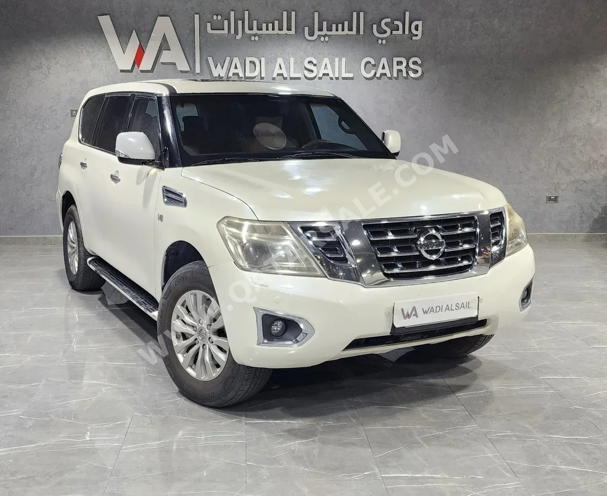 نيسان باترول اس اي 2016 اوتوماتيك 346,000 كم 8 سلندر دفع رباعي اس يو في أبيض
