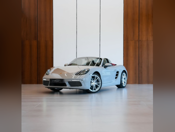 Porsche  Boxster  2025  Automatic  1,700 Km  4 Cylinder  Rear Wheel Drive (RWD)  Coupe / Sport  Gray  With Warranty