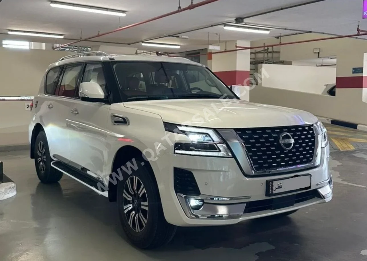 Nissan  Patrol  LE Titanium  2024  Automatic  36,000 Km  6 Cylinder  Four Wheel Drive (4WD)  SUV  White  With Warranty