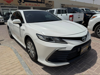 Toyota  Camry  Hybrid  2022  Automatic  273,000 Km  4 Cylinder  Front Wheel Drive (FWD)  Sedan  White