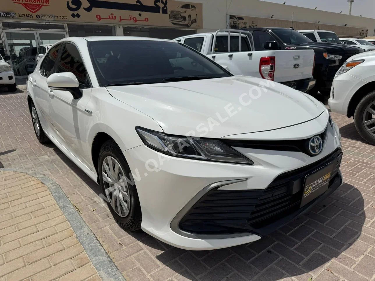 Toyota  Camry  Hybrid  2022  Automatic  273,000 Km  4 Cylinder  Front Wheel Drive (FWD)  Sedan  White