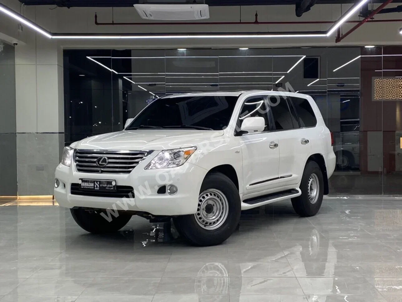 Lexus  LX  570  2010  Automatic  590,000 Km  8 Cylinder  Four Wheel Drive (4WD)  SUV  White
