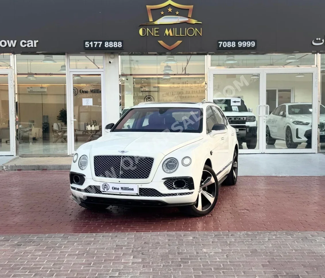 Bentley  Bentayga  2018  Automatic  99,000 Km  12 Cylinder  Four Wheel Drive (4WD)  SUV  White
