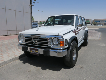 نيسان  باترول  1997  عادي  32,000 كم  6 سلندر  دفع رباعي  اس يو في  أبيض