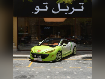 Peugeot  RCZ  2013  Automatic  128,750 Km  4 Cylinder  Rear Wheel Drive (RWD)  Sedan  White and Green
