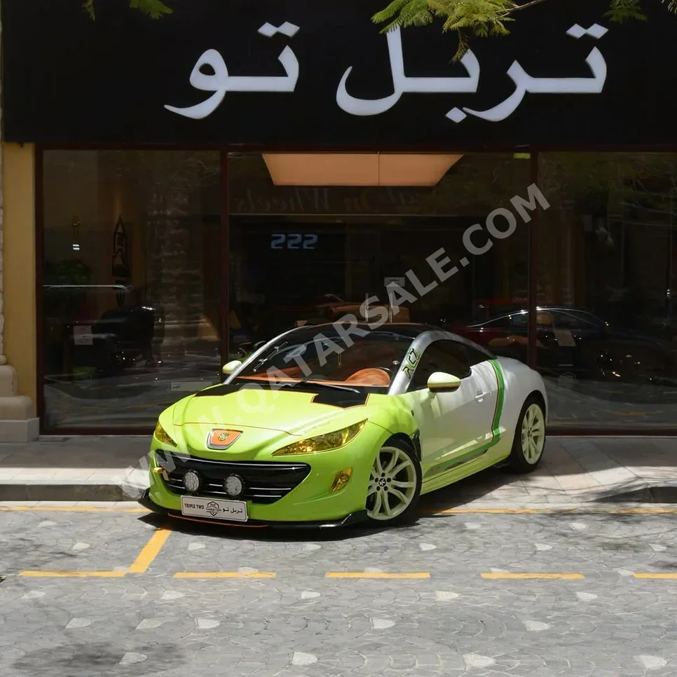 Peugeot RCZ 2013 Automatic 128,750 Km 4 Cylinder Rear Wheel Drive (RWD) Sedan White and Green