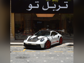 بورش  911  جي تي 3 ار اس - وايساخ باكج  2024  اوتوماتيك  3,450 كم  6 سلندر  دفع خلفي  كوبيه \ سبورت  أبيض