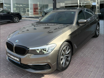 BMW  5-Series  520i  2020  Automatic  70,000 Km  6 Cylinder  Rear Wheel Drive (RWD)  Sedan  Gold