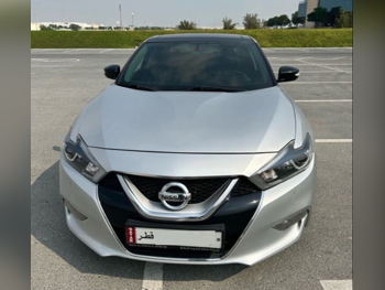 Nissan  Maxima  SV  2016  Automatic  164,000 Km  6 Cylinder  Front Wheel Drive (FWD)  Sedan  Black and Silver
