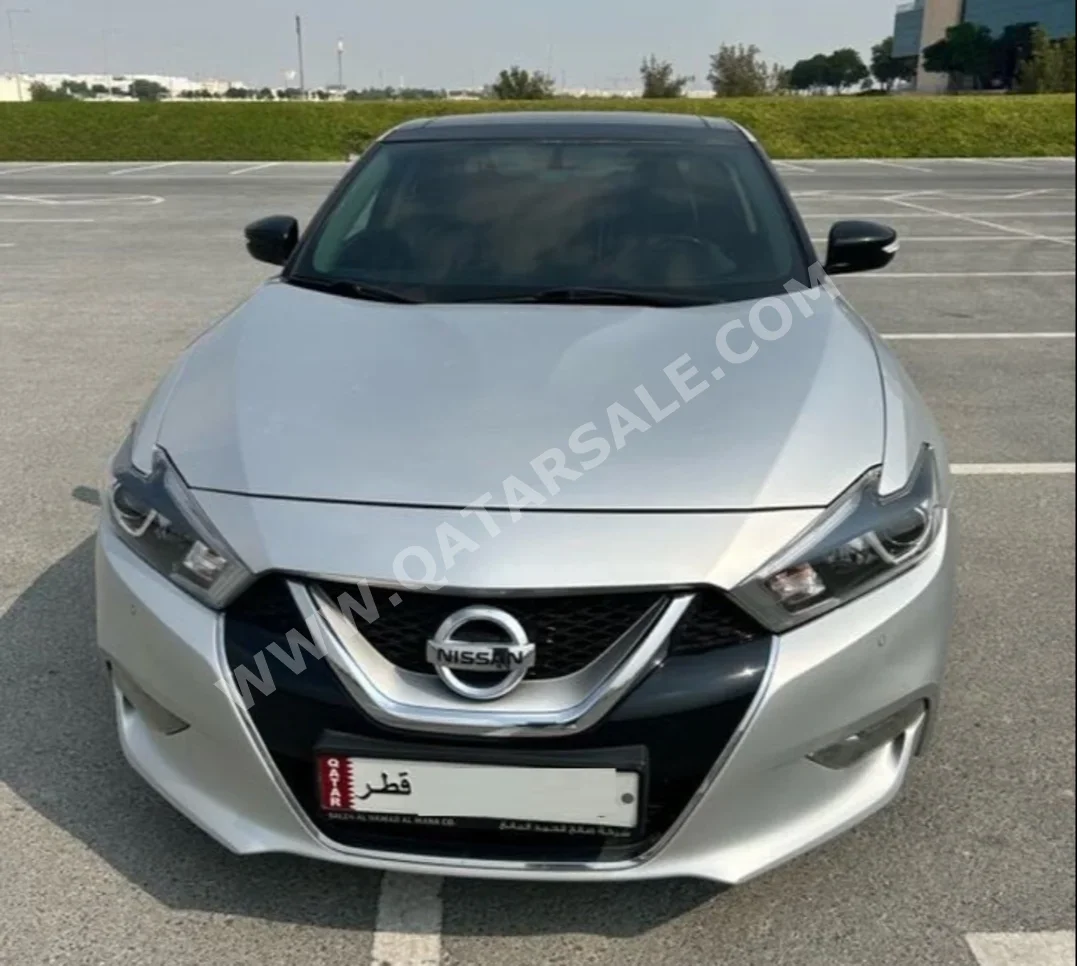 Nissan  Maxima  SV  2016  Automatic  164,000 Km  6 Cylinder  Front Wheel Drive (FWD)  Sedan  Black and Silver