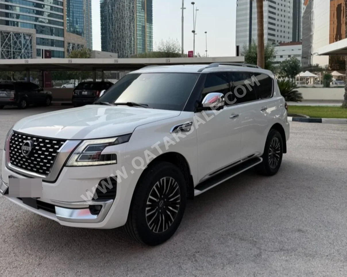 Nissan  Patrol  Platinum  2022  Automatic  111,000 Km  6 Cylinder  Four Wheel Drive (4WD)  SUV  White