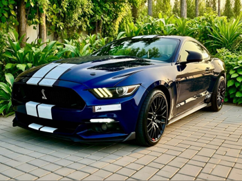 Ford  Mustang  GT Premium  2016  Automatic  146,000 Km  8 Cylinder  Rear Wheel Drive (RWD)  Coupe / Sport  Blue and White  With Warranty
