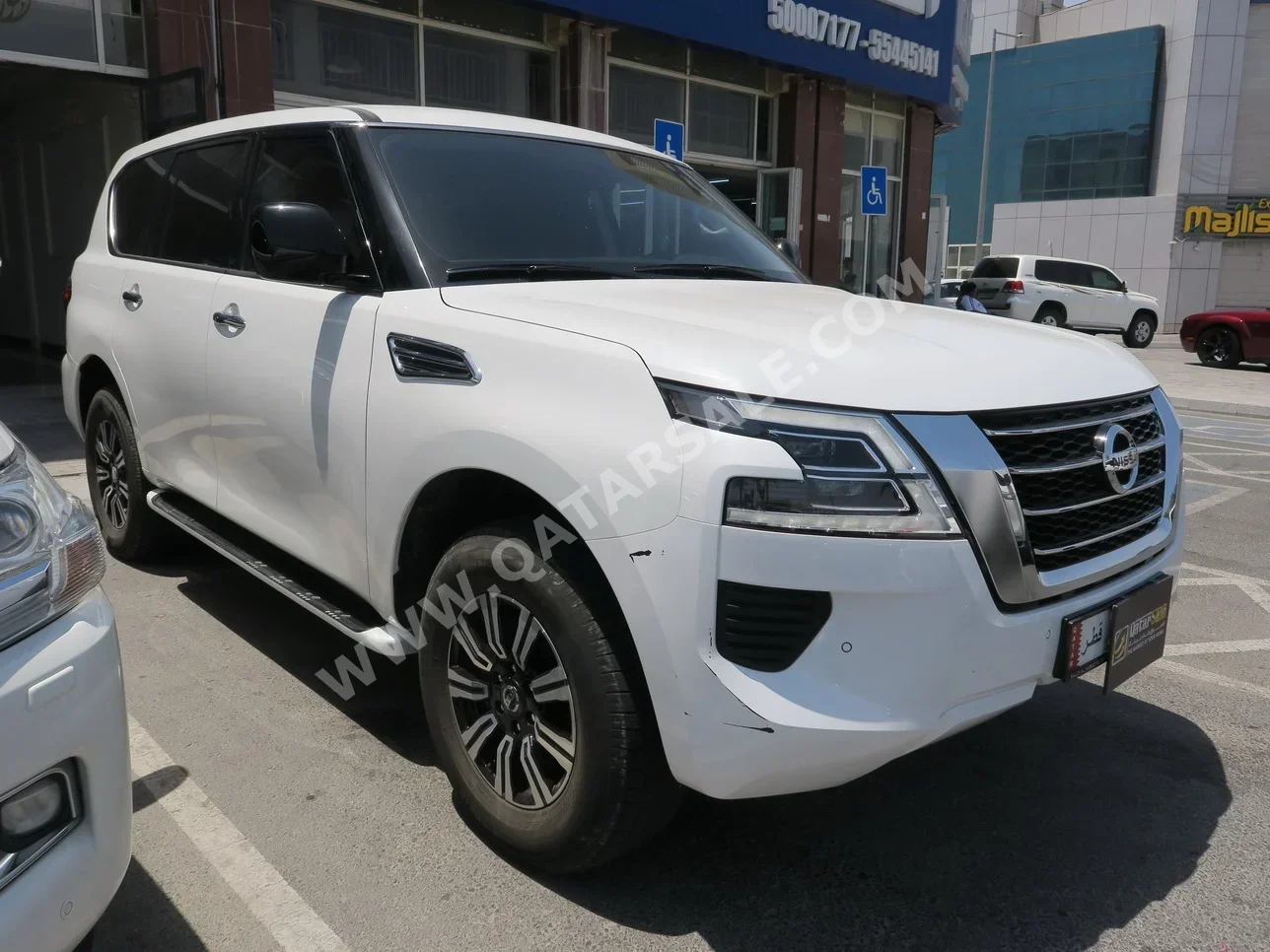 Nissan  Patrol  XE  2021  Automatic  60,000 Km  6 Cylinder  Four Wheel Drive (4WD)  SUV  White