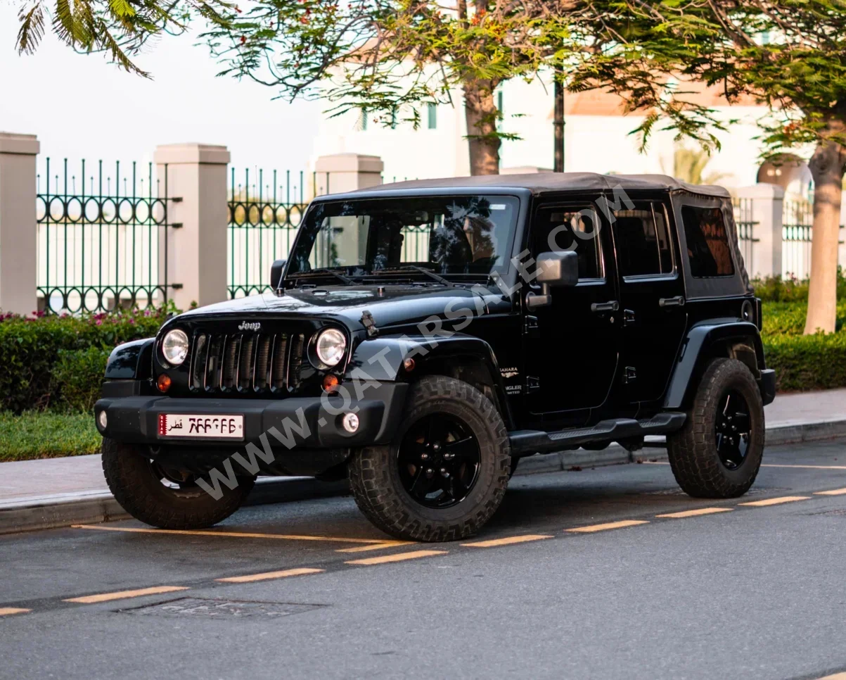 Jeep  Wrangler  Sahara  2013  Automatic  179,000 Km  6 Cylinder  Four Wheel Drive (4WD)  SUV  Black  With Warranty