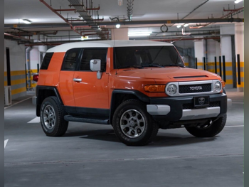 Toyota  FJ Cruiser  TRD  2013  Automatic  160,000 Km  6 Cylinder  All Wheel Drive (AWD)  SUV  Orange