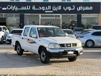 Nissan  Pickup  2012  Manual  147,000 Km  4 Cylinder  Rear Wheel Drive (RWD)  Pick Up  White