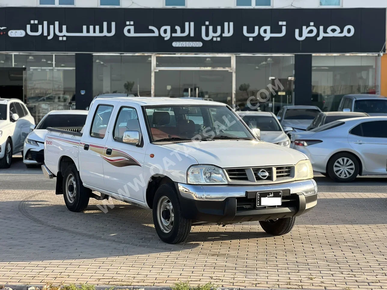 Nissan  Pickup  2012  Manual  147,000 Km  4 Cylinder  Rear Wheel Drive (RWD)  Pick Up  White