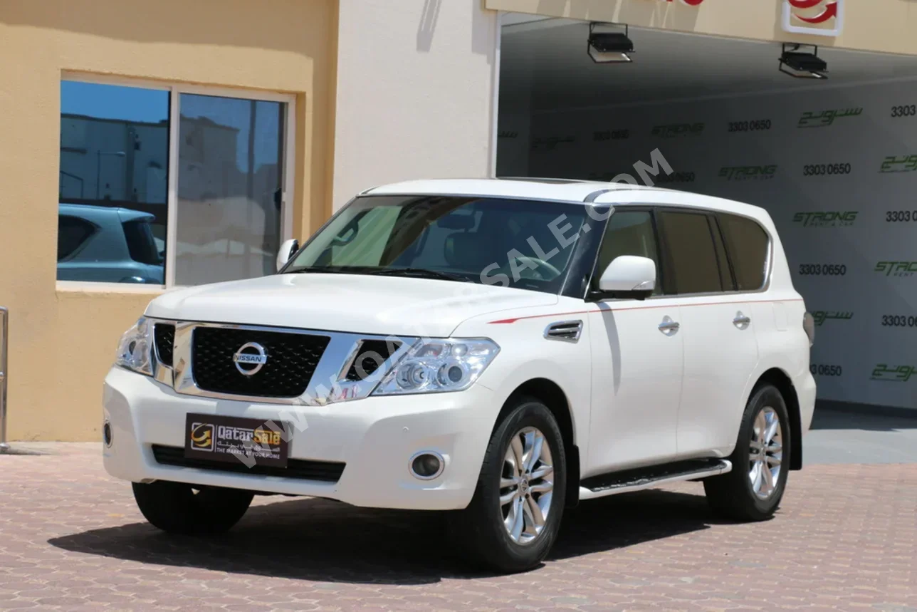 Nissan  Patrol  LE  2010  Automatic  130,000 Km  8 Cylinder  Four Wheel Drive (4WD)  SUV  White