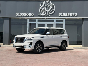 Nissan  Patrol  Titanium  2023  Automatic  86,000 Km  8 Cylinder  Four Wheel Drive (4WD)  SUV  White  With Warranty