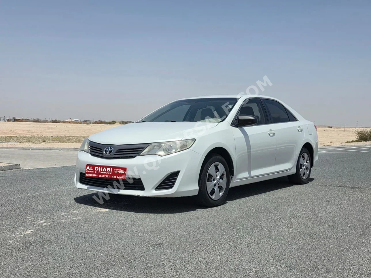 Toyota  Camry  GL  2013  Automatic  336,000 Km  4 Cylinder  Front Wheel Drive (FWD)  Sedan  White