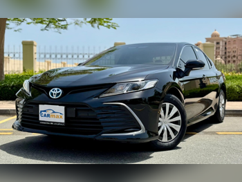 Toyota  Camry  Hybrid  2024  Automatic  5,000 Km  4 Cylinder  Front Wheel Drive (FWD)  Sedan  Black