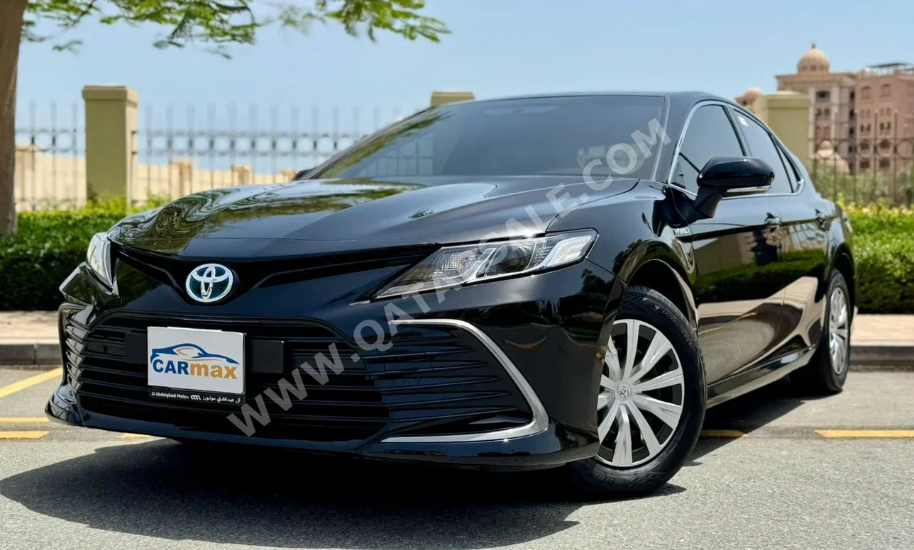 Toyota  Camry  Hybrid  2024  Automatic  5,000 Km  4 Cylinder  Front Wheel Drive (FWD)  Sedan  Black