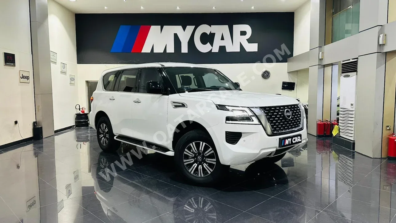 Nissan  Patrol  XE  2022  Automatic  65,000 Km  6 Cylinder  Four Wheel Drive (4WD)  SUV  White  With Warranty
