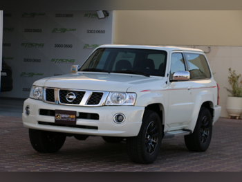 Nissan  Patrol  Safari  2021  Automatic  76,000 Km  6 Cylinder  Four Wheel Drive (4WD)  SUV  White