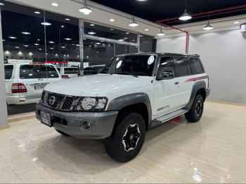 Nissan  Patrol  Super Safari  2022  Automatic  82,000 Km  6 Cylinder  Four Wheel Drive (4WD)  SUV  White and Silver  With Warranty