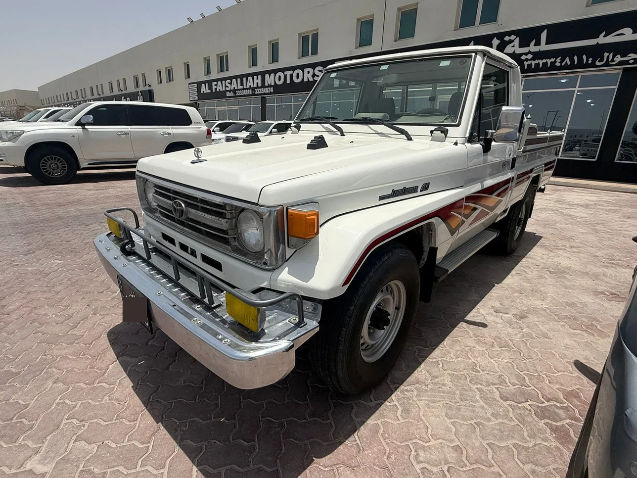 تويوتا لاند كروزر ال اكس 1996 عادي 150,000 كم 6 سلندر دفع رباعي بيكب أبيض