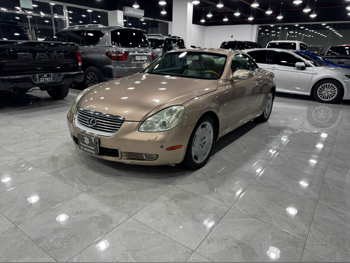 لكزس اس سي 430 2004 اوتوماتيك 133,000 كم 8 سلندر دفع خلفي كوبيه \ سبورت ذهبي