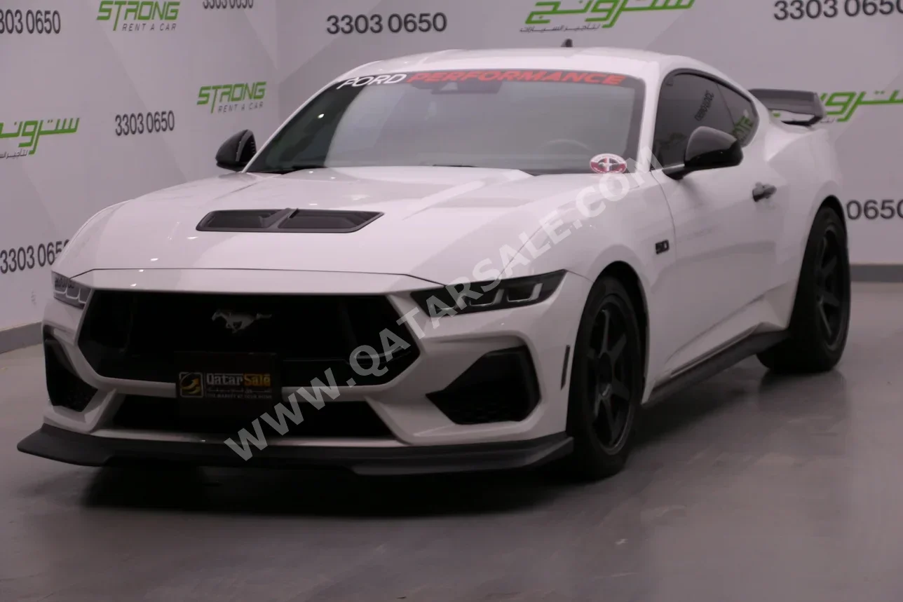 Ford  Mustang  GT  2024  Automatic  16,000 Km  8 Cylinder  Rear Wheel Drive (RWD)  Coupe / Sport  White  With Warranty