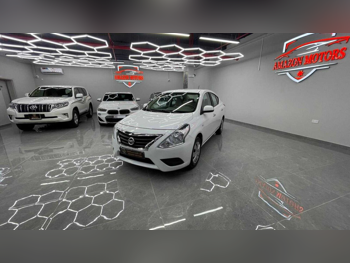 Nissan  Sunny  2022  Automatic  77,000 Km  4 Cylinder  Front Wheel Drive (FWD)  Sedan  White