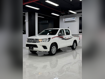 Toyota  Hilux  2023  Automatic  159,000 Km  4 Cylinder  Four Wheel Drive (4WD)  Pick Up  White