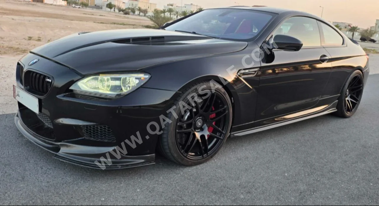 BMW  M-Series  6  2013  Automatic  129,000 Km  8 Cylinder  Rear Wheel Drive (RWD)  Coupe / Sport  Black