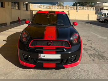 Mini  Cooper  Coupe  2013  Automatic  10,752 Km  4 Cylinder  All Wheel Drive (AWD)  Hatchback  Black and Red