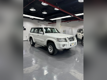 نيسان  باترول  سفاري  2004  اوتوماتيك  261,000 كم  6 سلندر  دفع رباعي  اس يو في  أبيض