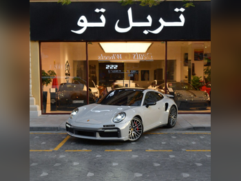 بورش  911  توربو  2021  اوتوماتيك  82,580 كم  6 سلندر  دفع خلفي  كوبيه \ سبورت  رمادي ناردو