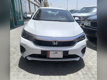 Honda  City  2024  Automatic  100,000 Km  4 Cylinder  Front Wheel Drive (FWD)  Sedan  White