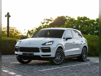 Porsche  Cayenne  Platinum  2023  Automatic  57,000 Km  6 Cylinder  All Wheel Drive (AWD)  SUV  White  With Warranty