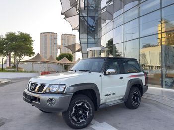 Nissan  Patrol  Super Safari  2021  Automatic  69,000 Km  6 Cylinder  Four Wheel Drive (4WD)  SUV  White