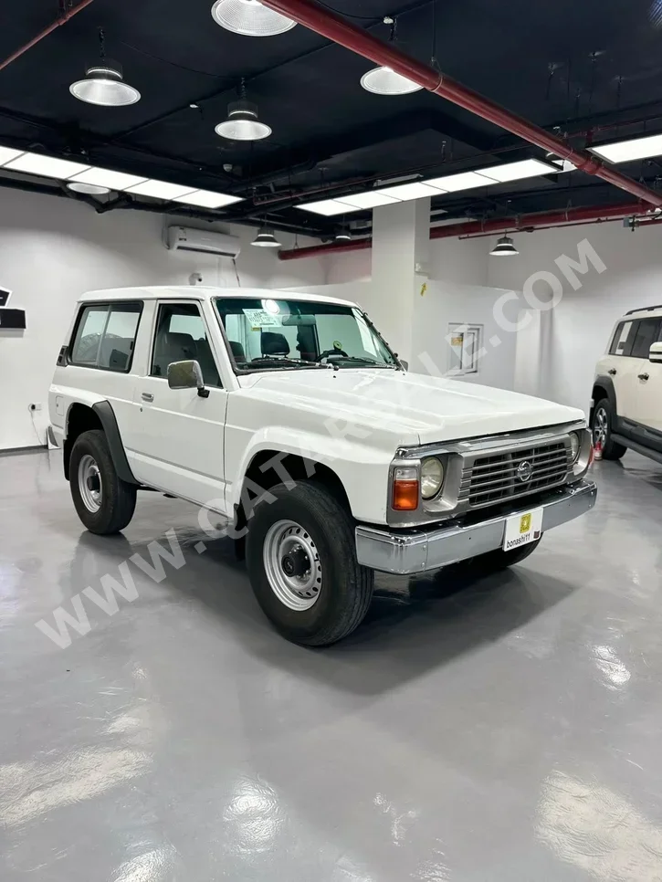 نيسان باترول جي ال 1997 عادي 150,000 كم 6 سلندر دفع رباعي اس يو في أبيض