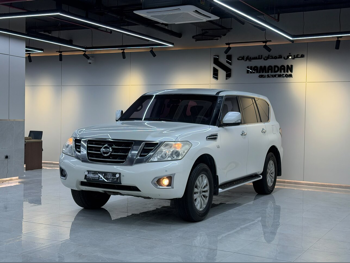Nissan  Patrol  SE  2014  Automatic  171,000 Km  8 Cylinder  Four Wheel Drive (4WD)  SUV  White