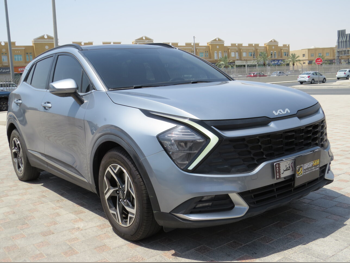 Kia  Sportage  2023  Automatic  98,000 Km  4 Cylinder  Front Wheel Drive (FWD)  SUV  Gray