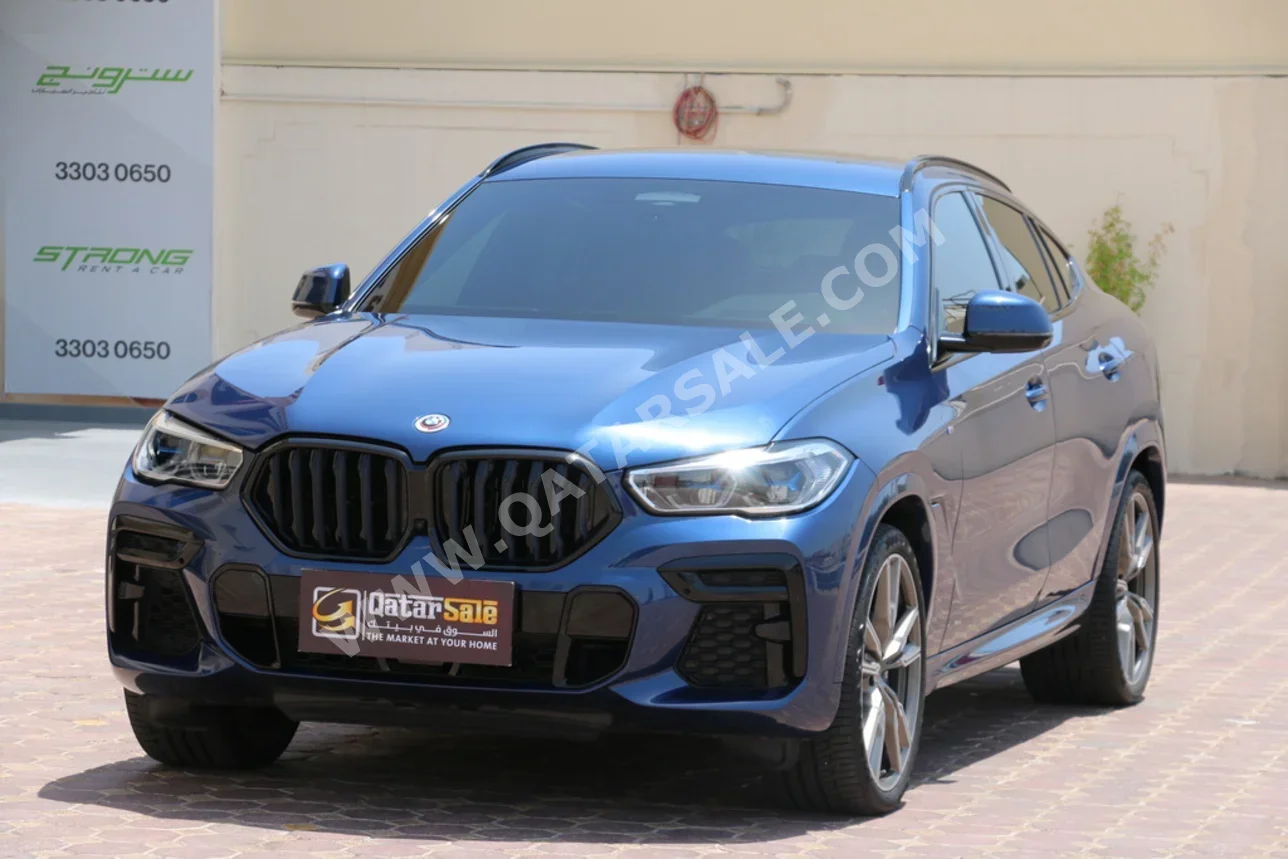 BMW X-Series X6 M50i 2023 Automatic 21,000 Km 8 Cylinder Four Wheel Drive (4WD) SUV Blue With Warranty