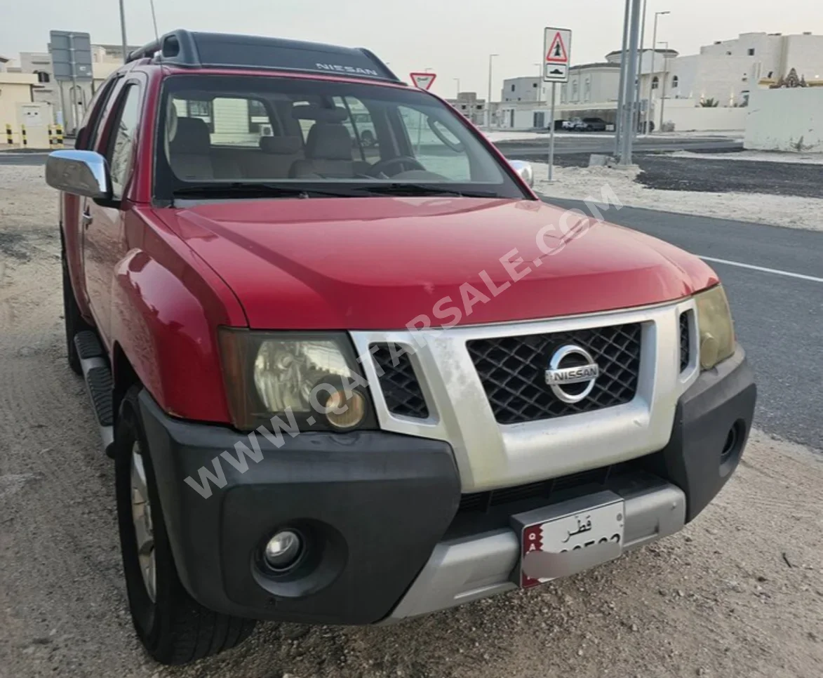 Nissan  Xterra  SE  2009  Automatic  216,000 Km  6 Cylinder  Four Wheel Drive (4WD)  SUV  Dark Red