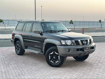 Nissan  Patrol  Super Safari  2022  Automatic  80,000 Km  6 Cylinder  Four Wheel Drive (4WD)  SUV  Black  With Warranty