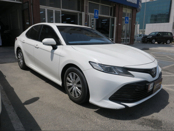 Toyota  Camry  2019  Automatic  162,000 Km  4 Cylinder  Front Wheel Drive (FWD)  Sedan  White